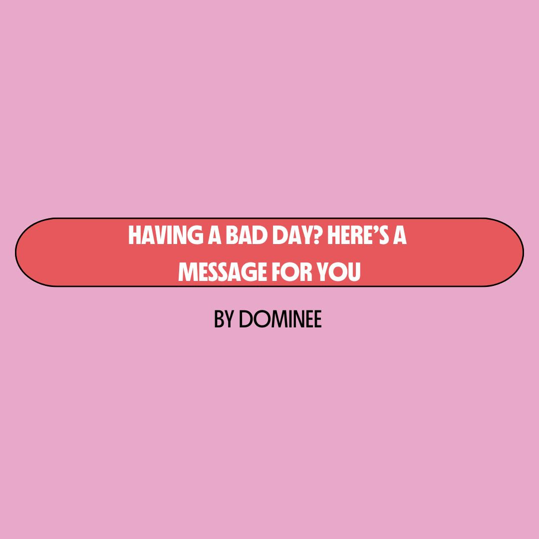 Pink background with a red text box containing white writing that reads: "having a bad day? Here's a message for you." Underneath is black writing that reads: "by Dominee."